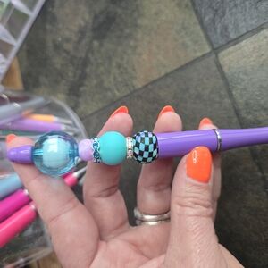 Purple Beaded Pen with Blue and Black Accents